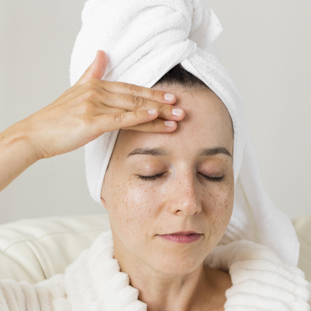 close-up-woman-applying-cream-her-face.jpg